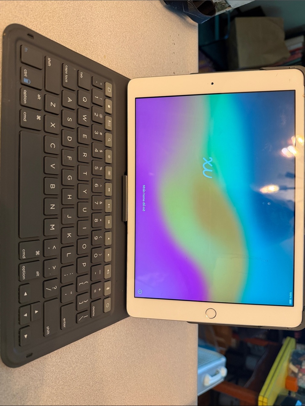 Apple iPad (7th Generation) and Black Keyboard Folio/Case